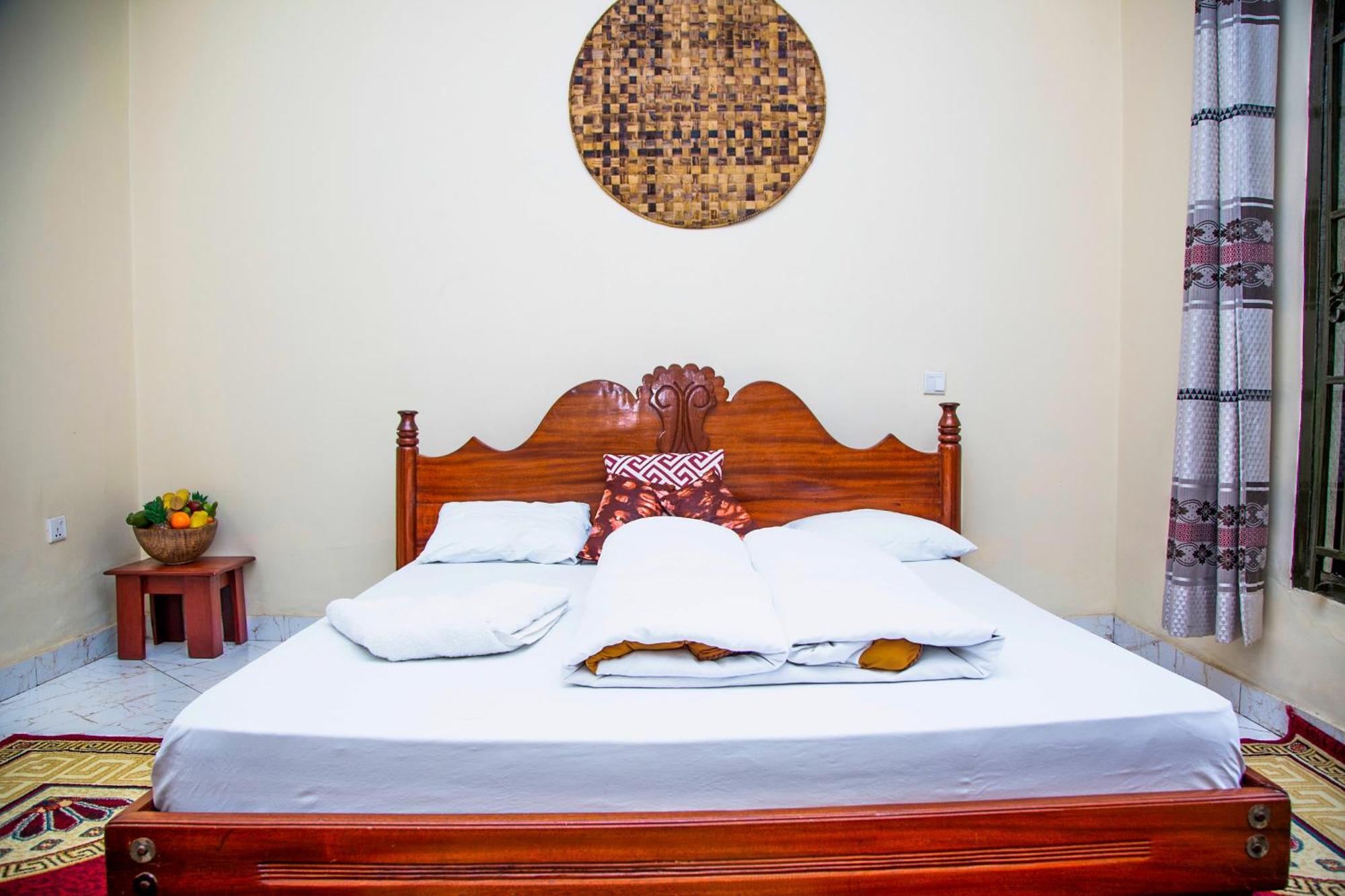 Virunga Homestays Рухенгері Номер фото